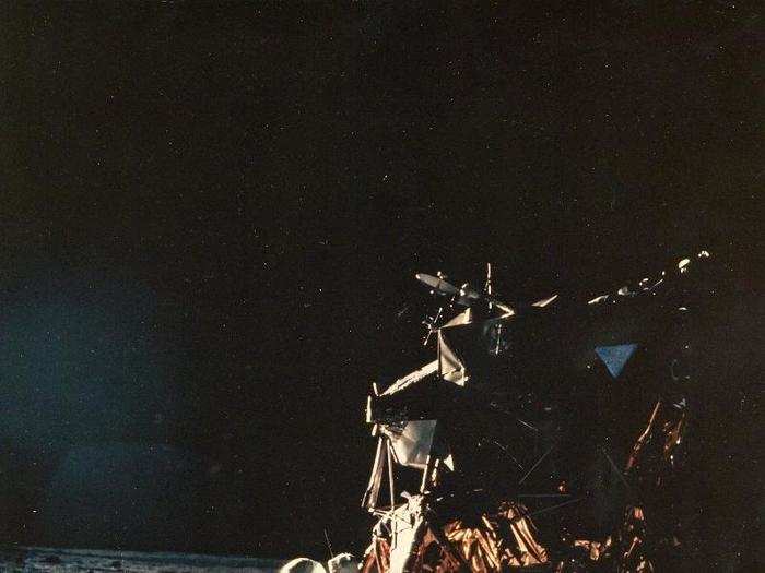 The very first photograph of a man — Neil Armstrong — standing on the surface of another world, in July 1969.