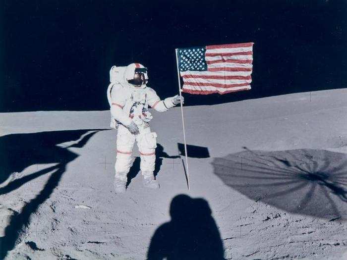 Alan Shepard and the American flag during Apollo 14, in February 1971. His companion and photographer