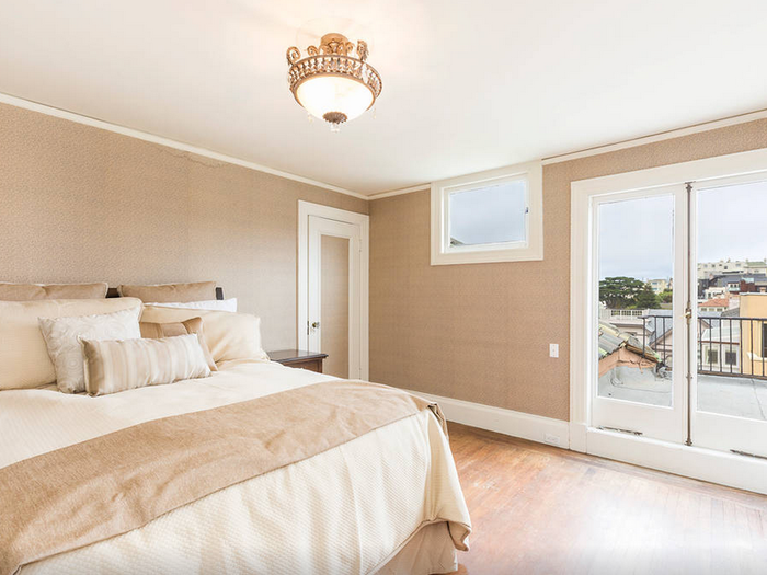 Some bedrooms, like this one, have sprawling views of San Francisco.