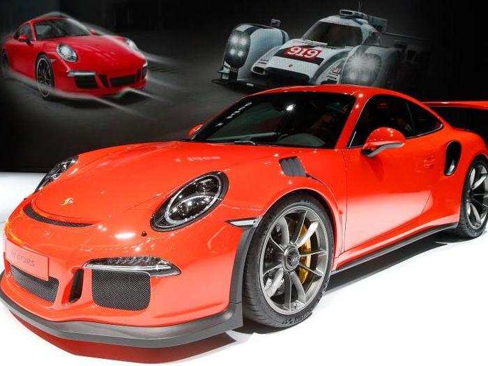 No car show is complete without a Porsche. In this case, a race-ready Porsche 911 GT3 RS and ...