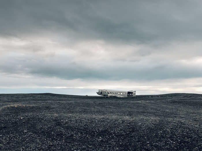 You can visit an abandoned US Navy DC plane on the black beach of Sólheimasandur.