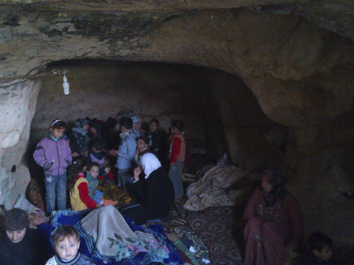 Residents take shelter in a similar cave near Hama in this photo from 2012. The civil war has been raging in Syria for almost five years.