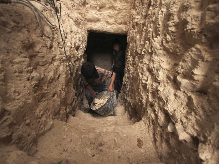 Even children help dig the shelters.