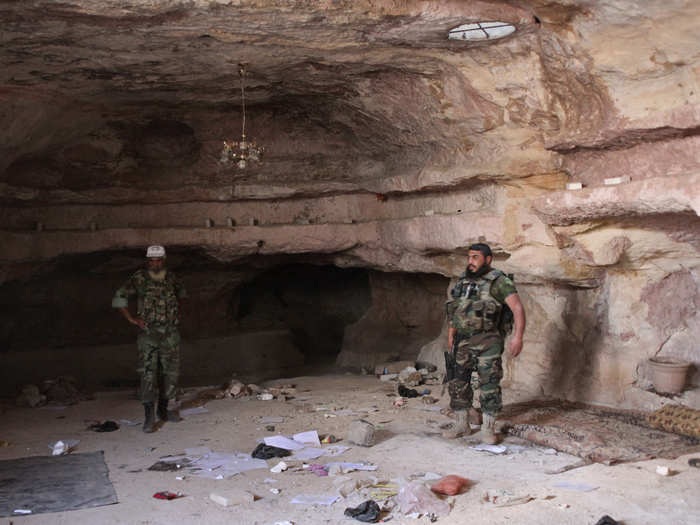 Once they enter the cave, the regime troops attempt to find any rebel soldiers, ammunitions, or supplies that are left over.