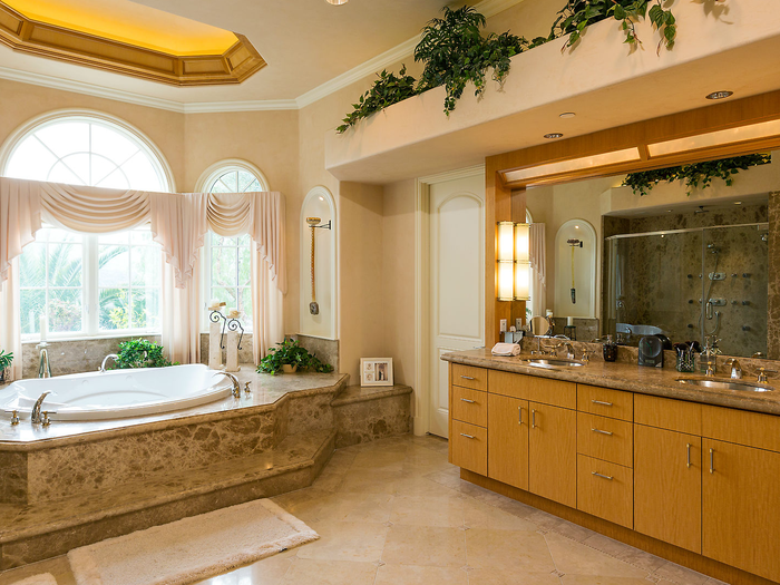 If you want the whole spa experience, the master bath has its own Whirlpool tub and a sauna.