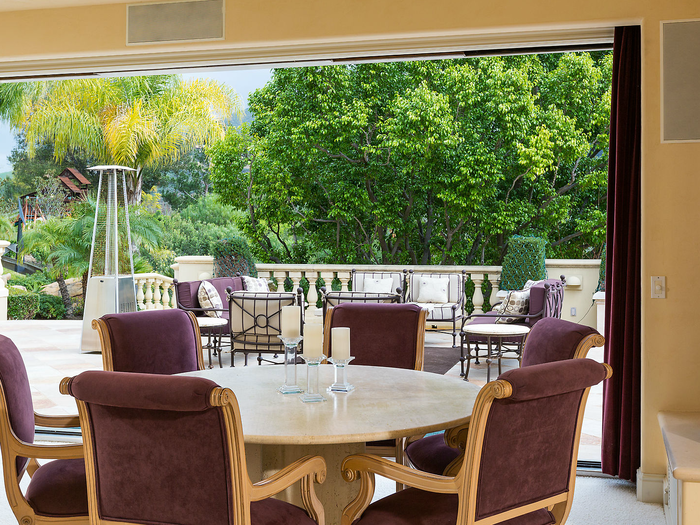 Sliding glass doors open this area to a balcony outside.