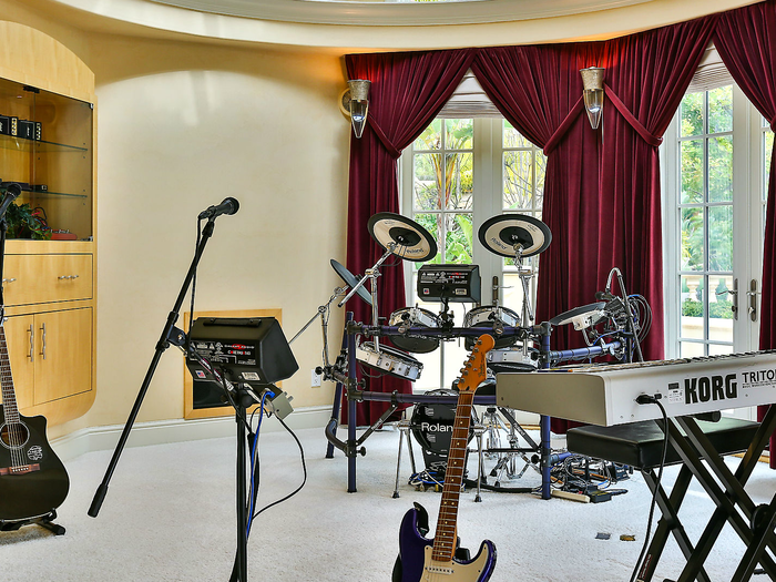 Gates seems to be using the other side of the room for band practice.