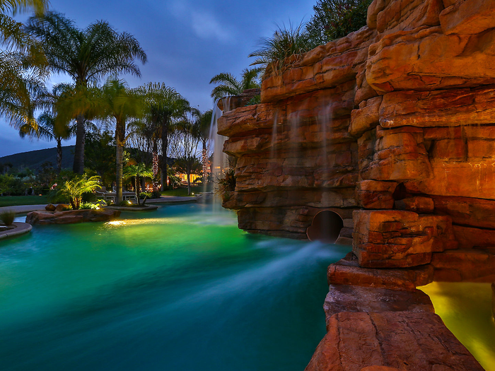 A 120-foot water slide empties into the pool.