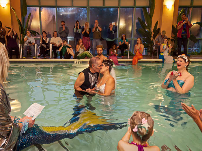 Like furries, many attendees adopt a "mersona," or character bearing a personality or traits they wish to exhibit. Cookie Ramirez, shown here having her wedding at Merfest, is known as "the Harlem Mermaid." She credits adopting a "mersona" with helping her get over agoraphobia and working through bipolar disorder.