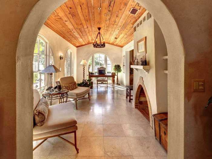 Mediterranean archways are central to nearly every room in the house, both inside and out.