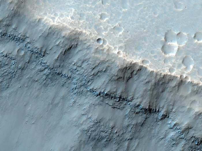 Pictured here is an area about two-thirds of a mile across in the Aureum Chaos region, which is a famous part of Mars that was first mapped by astronomer Giovanni Virginio Schiaparelli more than 100 years ago.