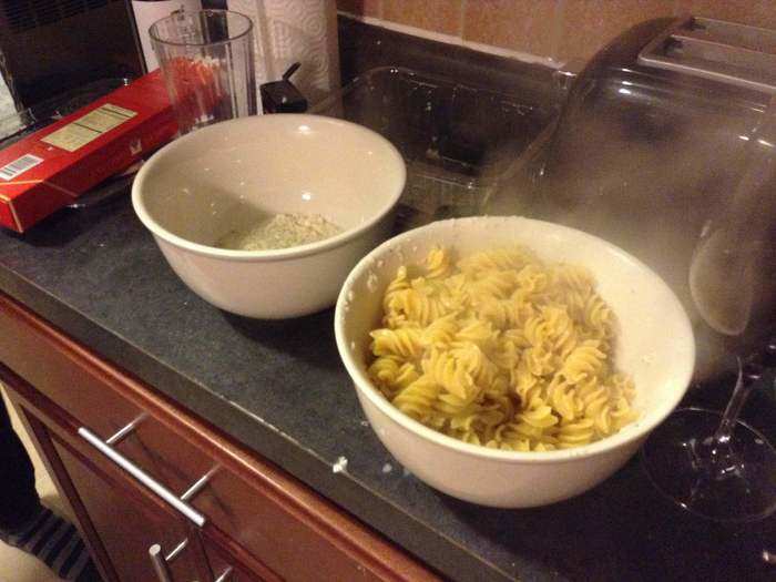 Transfer the pasta to the bowl full of cheese. Add a bit of olive oil and some of the pasta water.