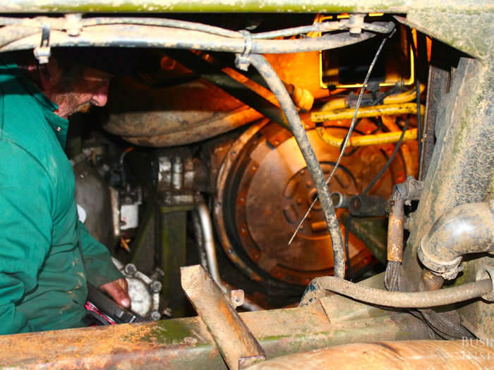 The mechanics were fitting a new engine on a Soviet tank.