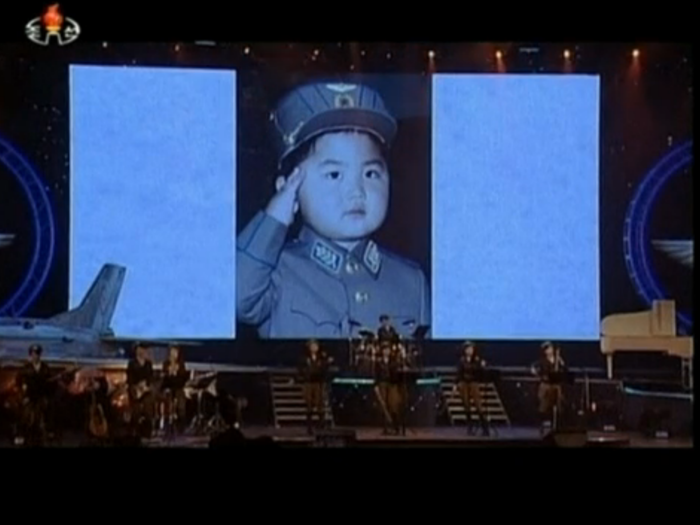 At an event in North Korea during 2014, pictures of Kim Jong Un during his childhood — dressed as a cute version of the brutal dictator he would become.