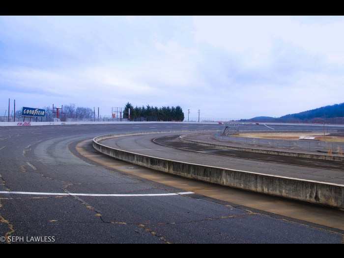 Weeds and other plants have made sure the once smooth surface of the track is no longer race-worthy.