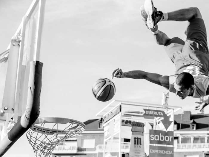 During practice at the Basketball World Cup in Madrid, a Hungarian basketball player attempts a dunk. "I haven