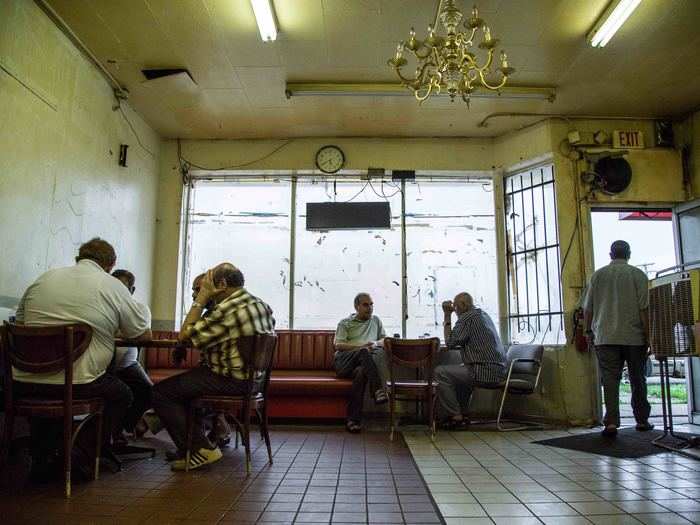 In Alraffedean Cafe, a local coffee house where Iraqi immigrants meet daily after work, the conversation always circles back to life at home.
