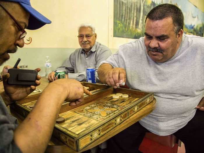Customers can often be found playing a game of Taolee, or Backgammon, just as they would do in coffee houses in Iraq.