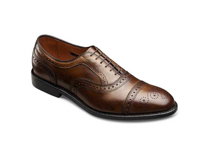 A pair of brown dress shoes.