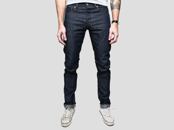 A pair of dark denim jeans.