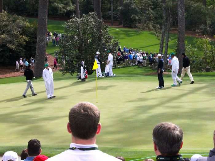 On the green at 10 were Phil Mickelson, Dustin Johnson, Jason Dufner, and Rickie Fowler. Fowler and Mickelson were playing Johnson and Dufner in a match. During his press conference, Mickelson said Fowler shot 30 on the back nine, to beat Johnson and Dufner.