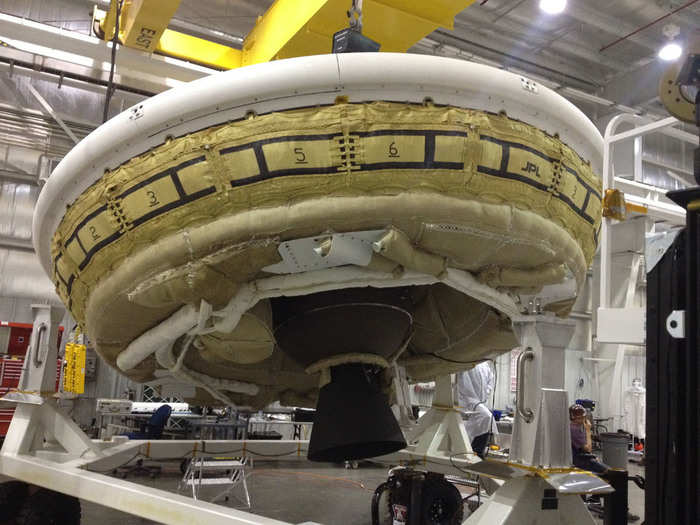 The SIAD does its job by wrapping around the body of the LDSD and then inflating with pressurized gas. NASA has two different versions of the SIAD: One that expands to make a circle 20-feet wide that could be used on future robotic missions and another that is 26-feet-wide for eventual manned missions.