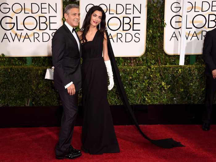 Shortly after their wedding, the couple walked the red carpet at the Golden Globes in Beverly Hills. Alamuddin Clooney was dashing in a Dior dress and white gloves.