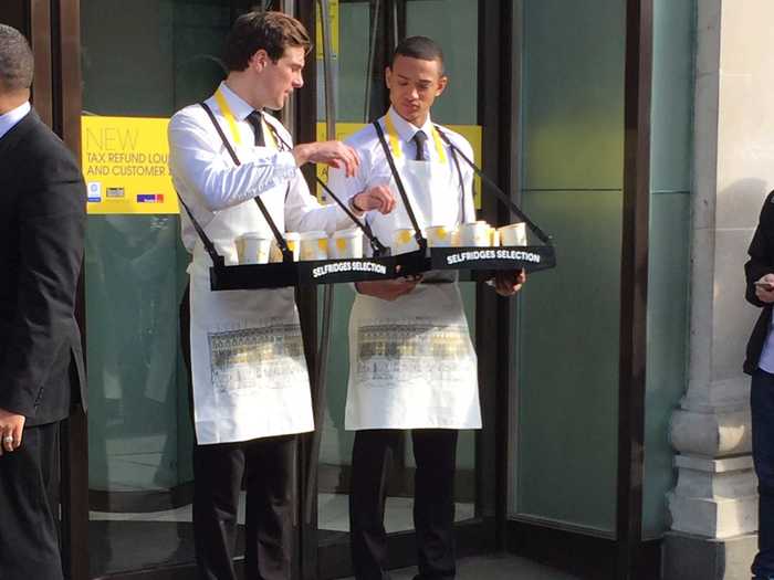 Selfridges sent some employees out to offer drinks to people queueing.