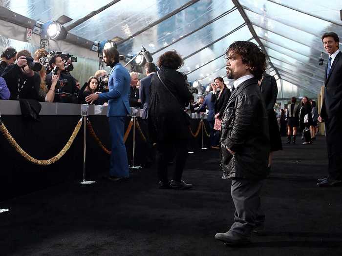 He recently spilled a major show spoiler, accidentally. In an interview with Popsugar, Dinklage said if he could ask the author one question, it would be, "Do I die? I just wanna know." His response tells fans that Tyrion survives season 5, which premieres April 12.