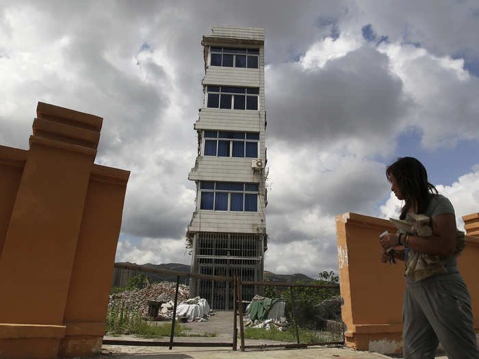 The owner of this partly demolished nail house in Rui