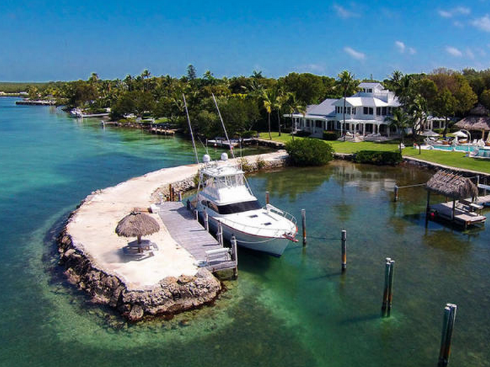 The bay front estate also features a deep-water boat basin with a jetty that makes the property accessible for yachts.