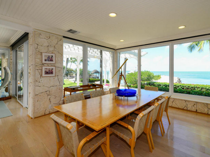 The dining room offers spectacular waterfront views.