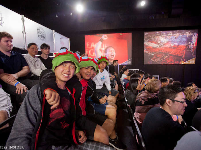 The stands were packed with fans wearing team gear, holding figurines or wearing costumes of their favorite game characters. More than 200,000 more fans were watching online.