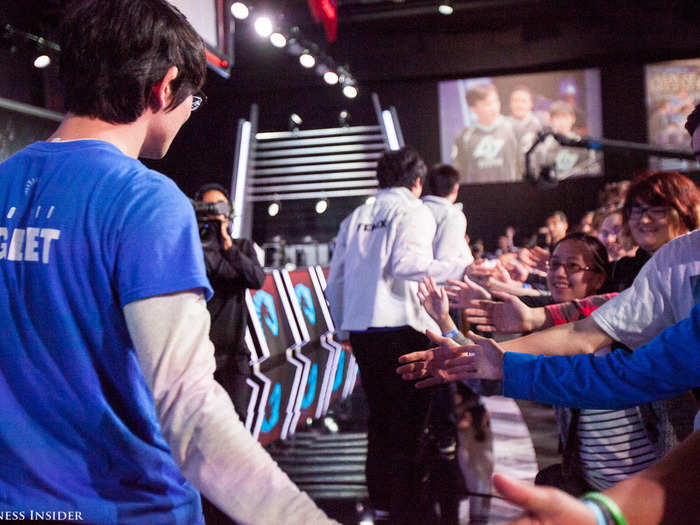 Liquid high-fives the fans that make it to the front of the stage first. Piglet had a huge grin on his face.