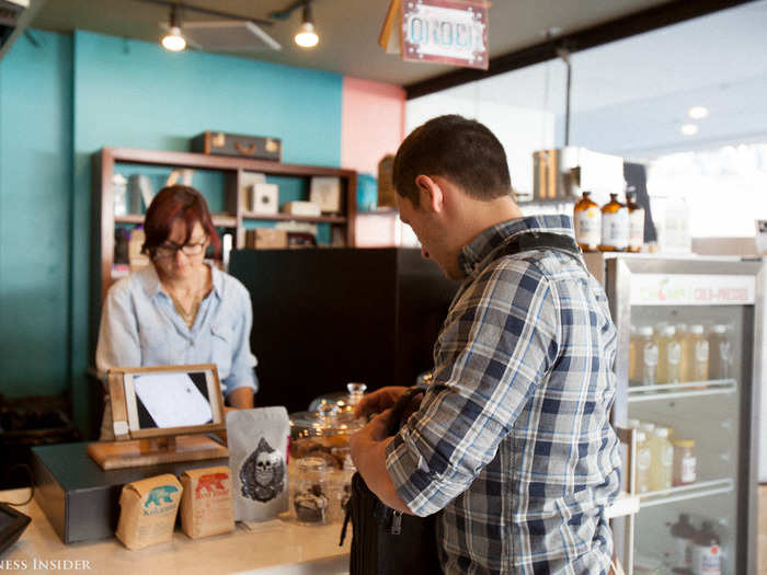 Next, Arhancet stops by a nearby cafe to grab iced coffee. He says that he drinks more coffees per day than he can count.