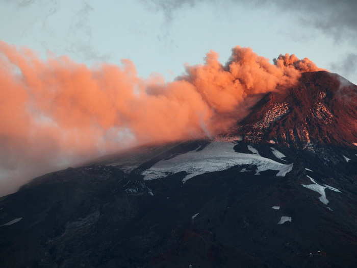 Smoke and lava spew from Chile