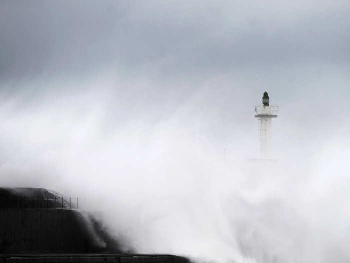 Huge waves crash onto the San Esteban de Pravia seafront in the northern Spanish region of Asturias.