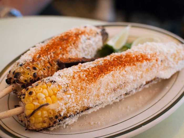 Corn on the cob is done a little differently in Cuba. The corn is grilled, rolled in cojita cheese, sprinkled generously with chili powder, and finished off with some lime juice, making for a richer and spicier taste.