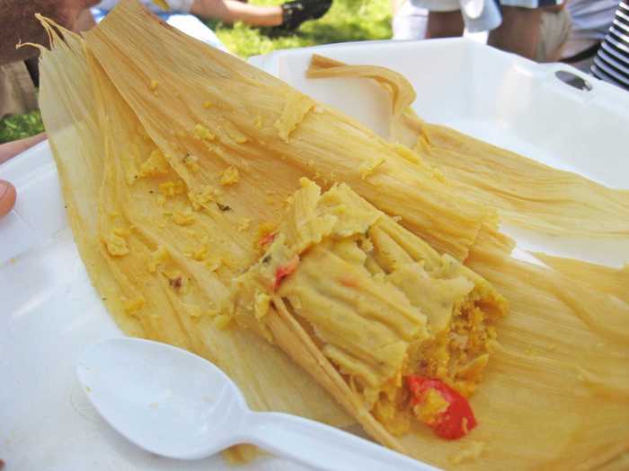 The biggest difference between Cuban tamales and Mexican tamales is that in Cuban tamales, the meat (usually pork) is mixed in with the dough of the tamale, instead of being used as a filling. Cubans also use field corn to make their tamales, which is less sweet and more mealy than the corn you