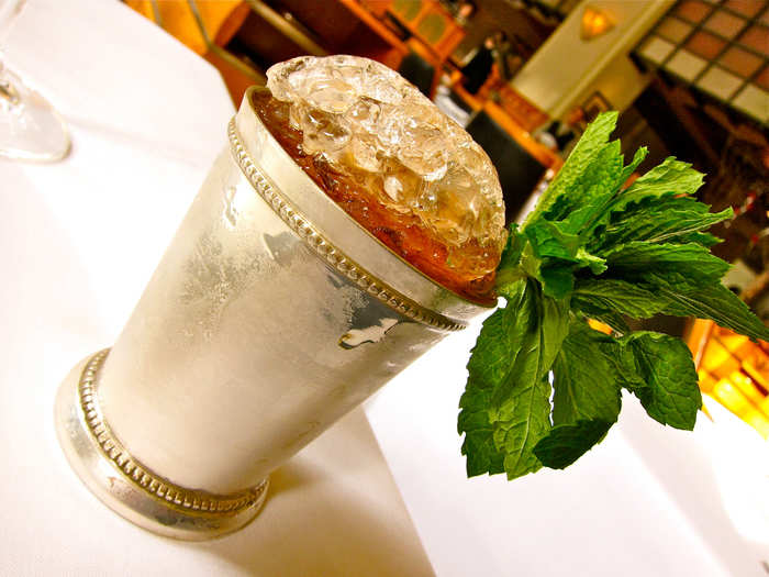 Wine glass empty? Swap it out for a mint julep with a bouqet of mint leaves so large, you could wear it as a hat at the Kentucky Derby.