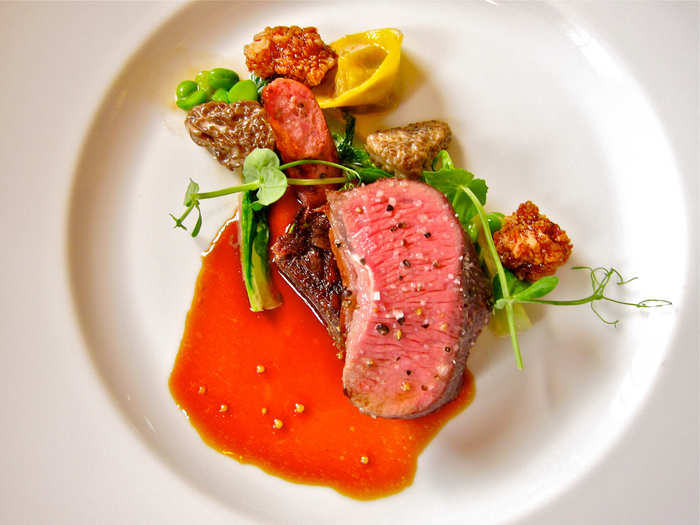 Four different preparations of Colorado lamb accompanied the large, pink, herb-roasted cut in the center of the plate. The lamb ravioli, lamb sausage, lamb short rib, and sweetbreads proved there