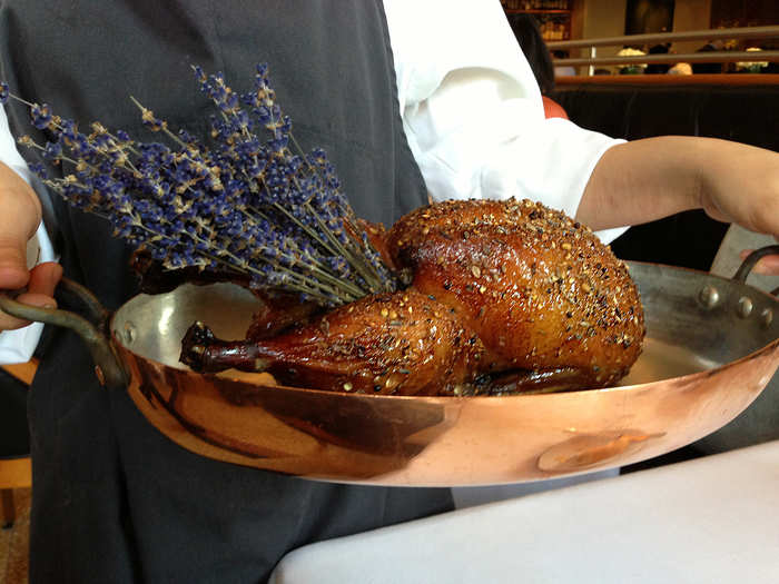 A dining room manager delivered the star of the meal, the Muscovy duck stuffed with lavender and glazed with honey, to the table.