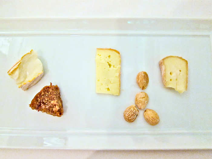 Next, a fromage cart pulled up table-side. The server doled out a selection of artisanal cheese based on the diner