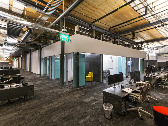 Riot says that its conference rooms are intentionally in the center of work areas, "so the teams aren