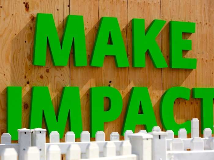 At the "Make Impact" booth, visitors could plant vegetables or send cards to kids in need at Stanford