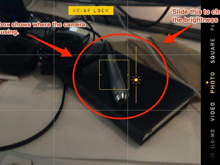 Tap on the screen to focus, and then slide your finger up and down on the slider to adjust the brightness of your shot.