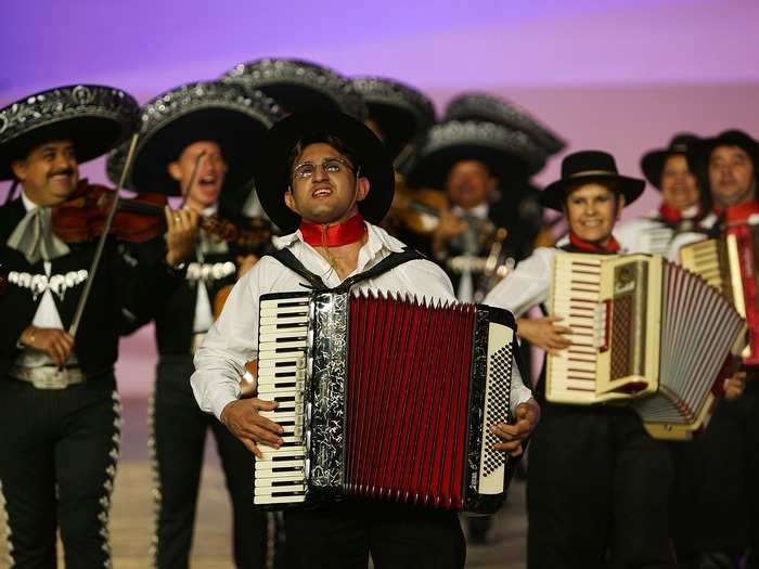 Ernesto proposed to her with the aid of a Mariachi band in Mexico.