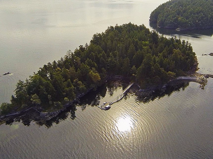 In British Columbia, Mowgli Island is on sale for $3.16 million. A four-bedroom home has more than 1,000 square feet of outdoor deck space.