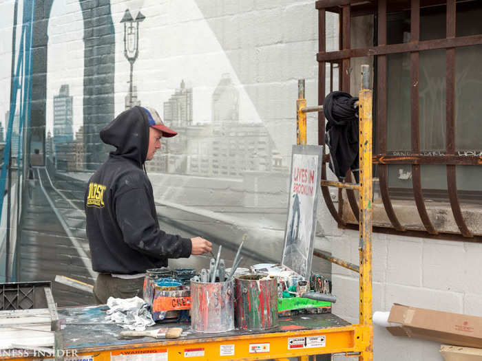 Professional mural painting is huge in Williamsburg, and many blank walls in the neighborhood have been turned into billboards, sporting beautiful hand painted ads.