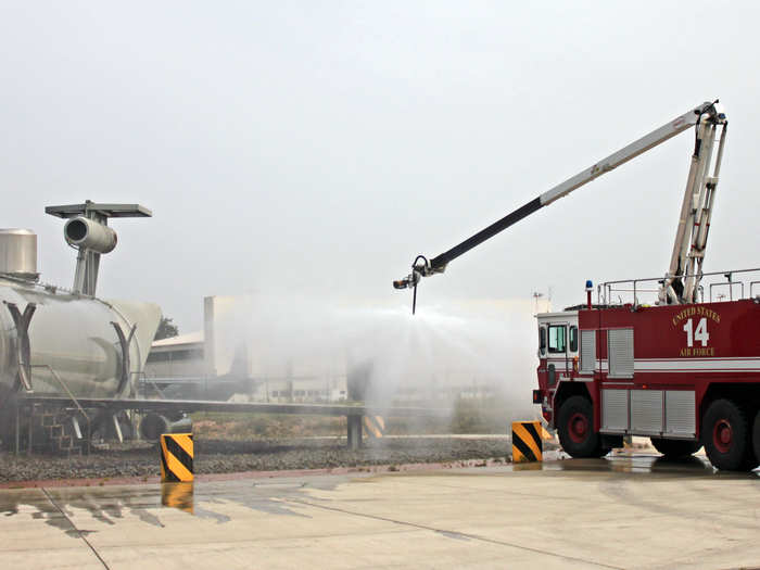 The fire team has a dummy aircraft and building on which it can practice drills.